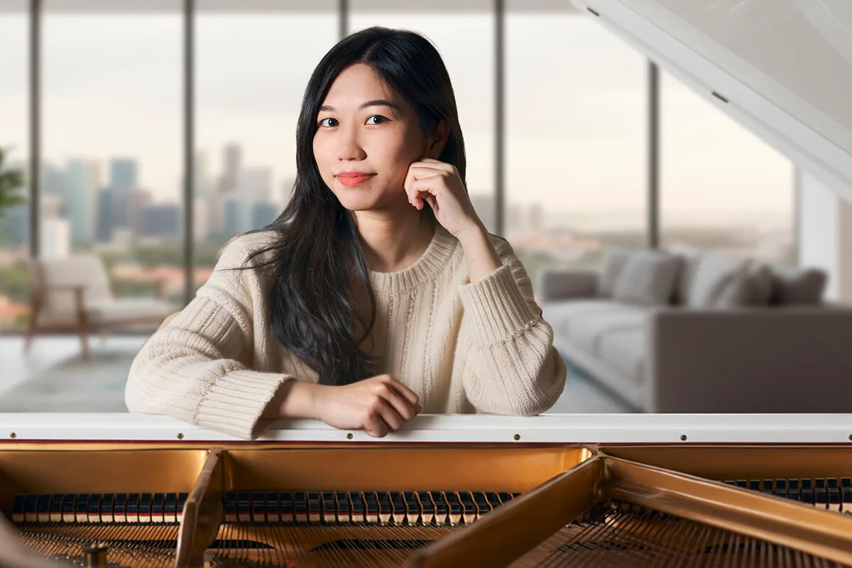 Pat - Piano Teacher in Singapore at the grand piano